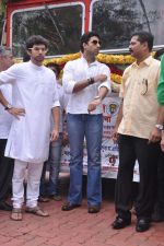 Abhishek Bachchan flags off 2 BEST buses along with Mayor of Mumbai Sunil Prabhu and Yuva Sena President Aditya Thackrey in Mayor_s Bungalow on 8th July 2013 (38).JPG